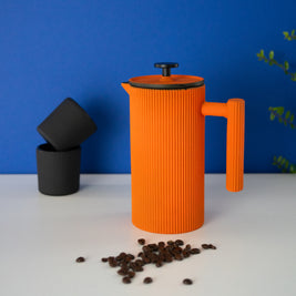 Cafetière à piston en fonte orange