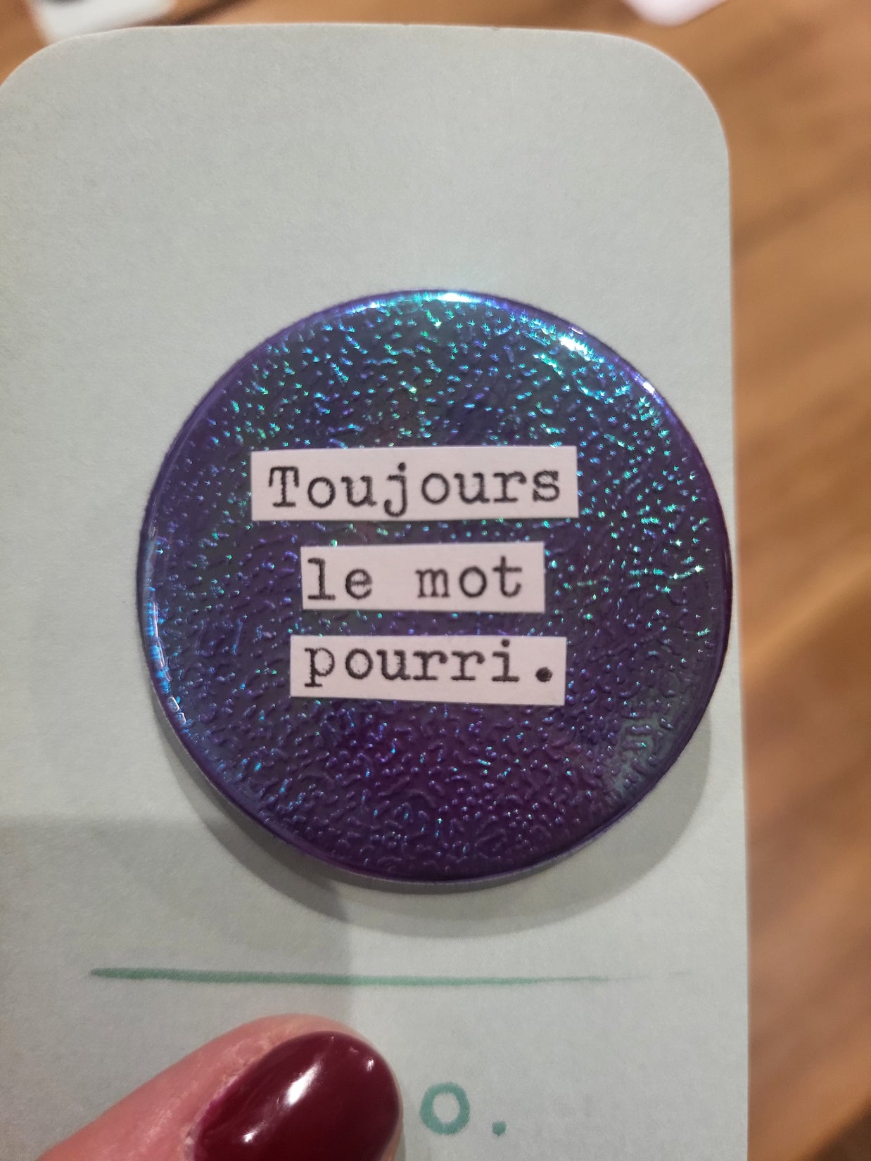 Badge Toujours le mot pourri
