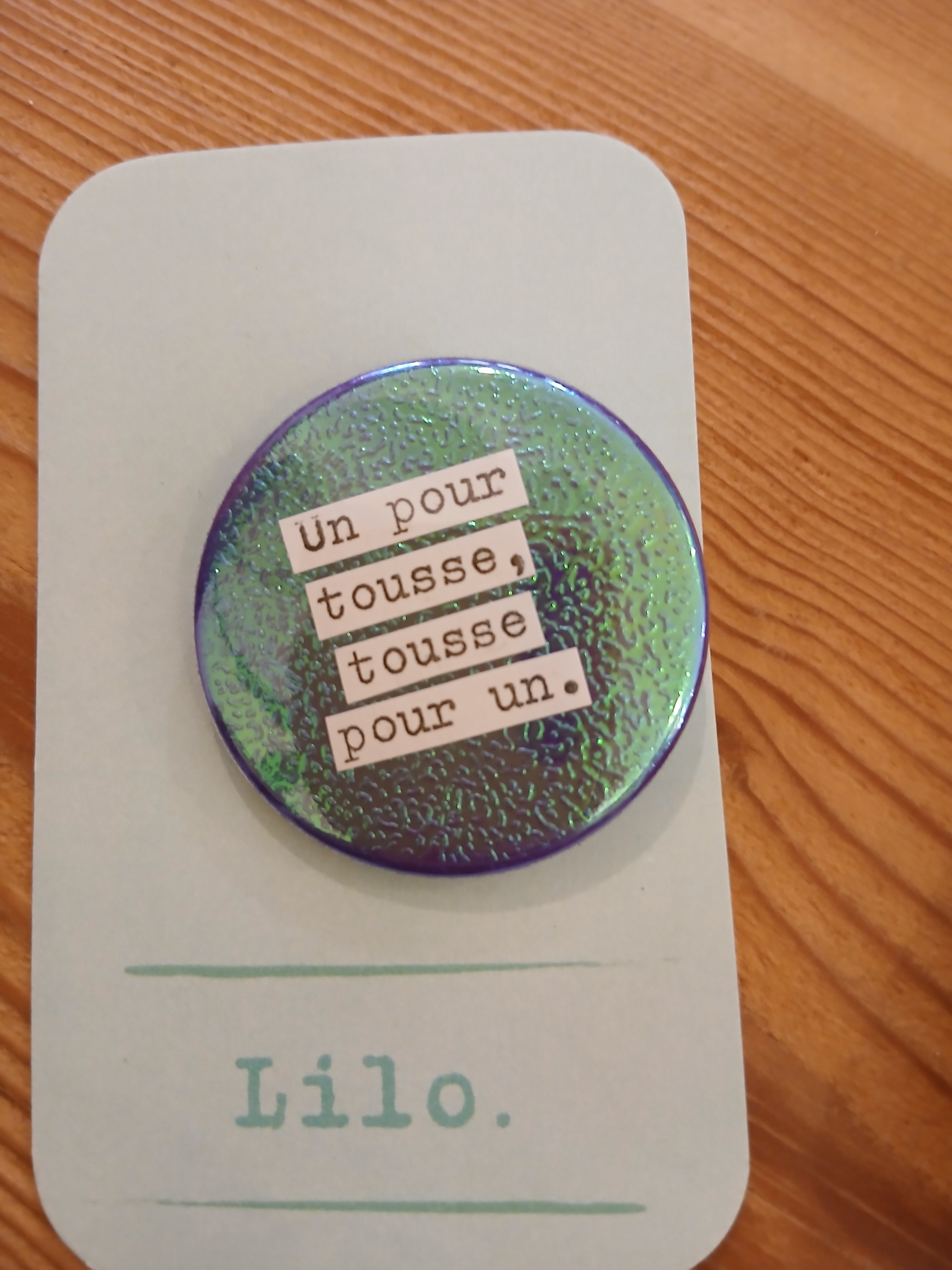 Badge Un pour tousse